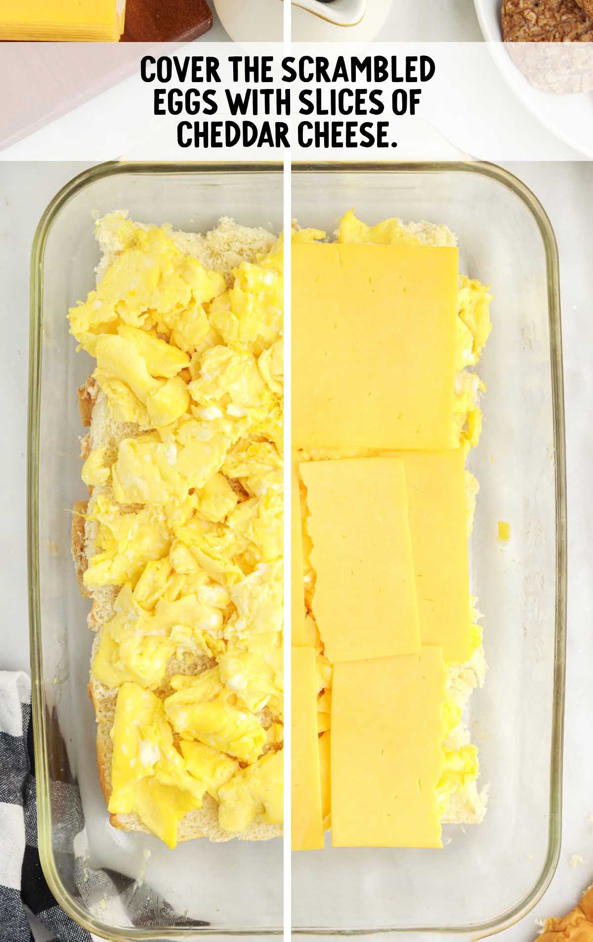 bread covered with scrambled eggs and slices of cheddar cheese