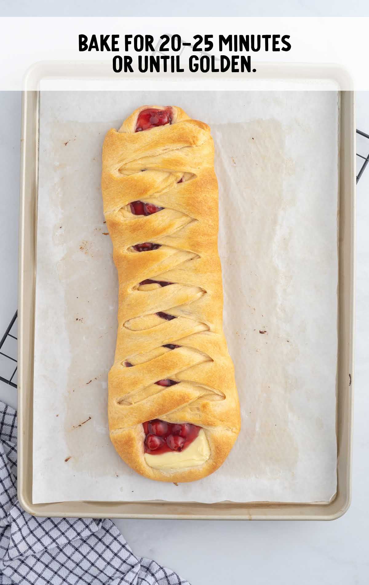 breakfast braid after being baked on a pan