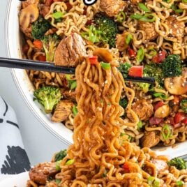 close up shot of a plate of chicken ramen stir fry with the stir fry being picked up with chopsticks and close up overhead shot of a pot of chicken ramen stir fry
