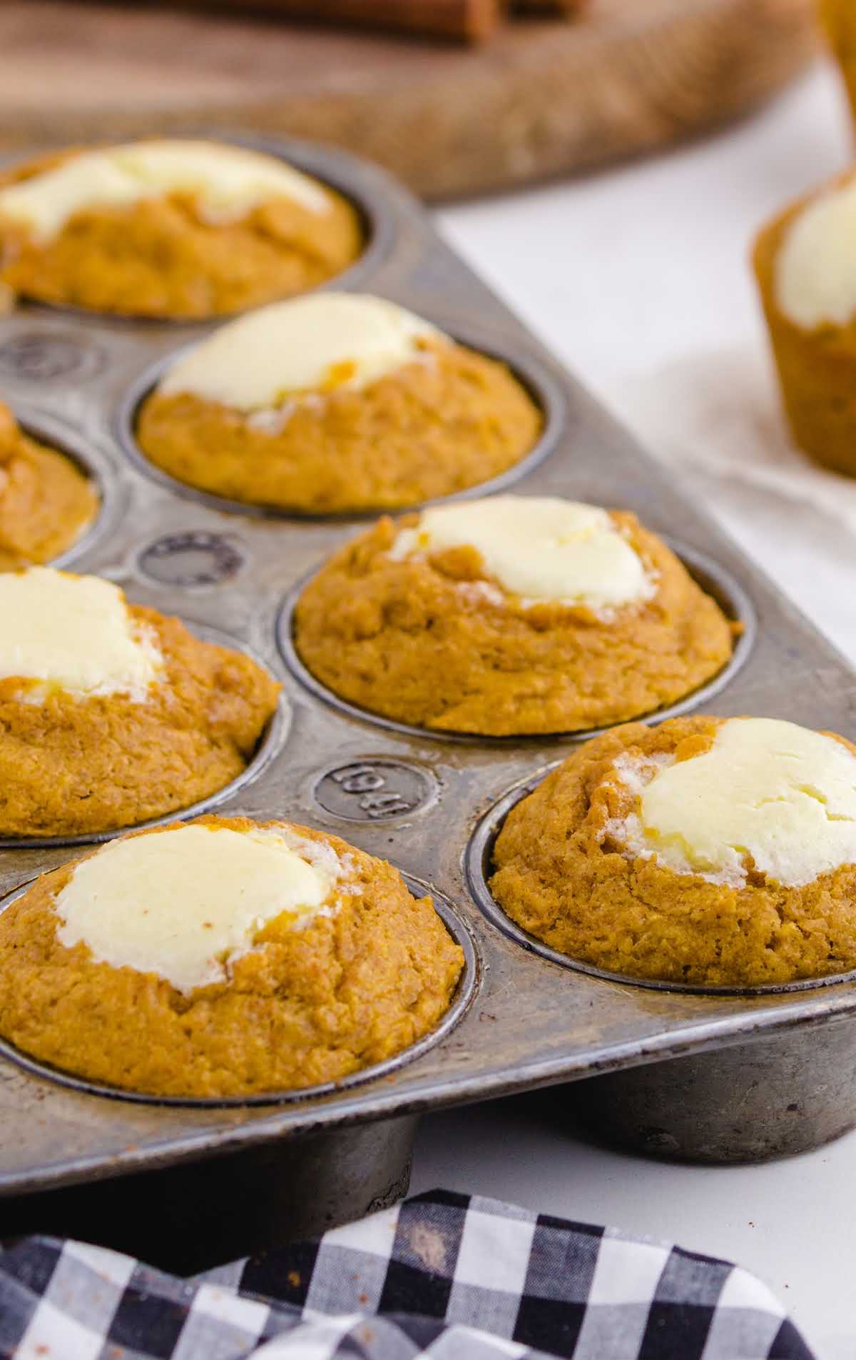 close up shot of muffins in a muffin tin pan