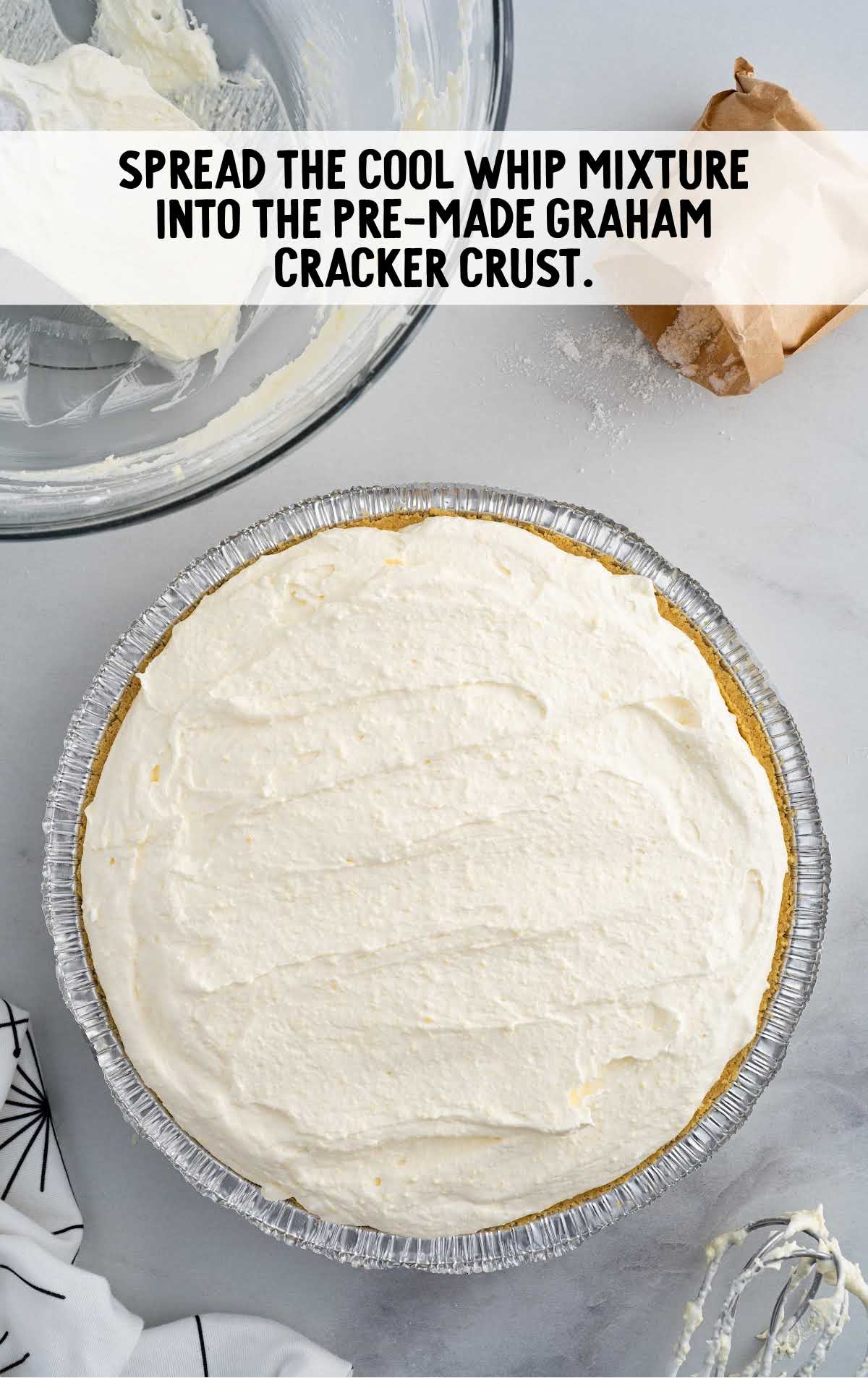 cool whip mixture added to the pre-made graham cracker crust