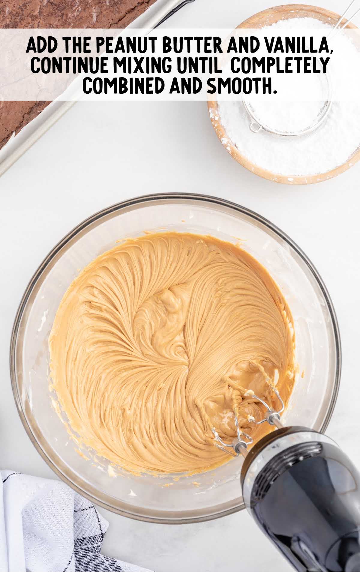 peanut butter and vanilla blended into the butter in a bowl