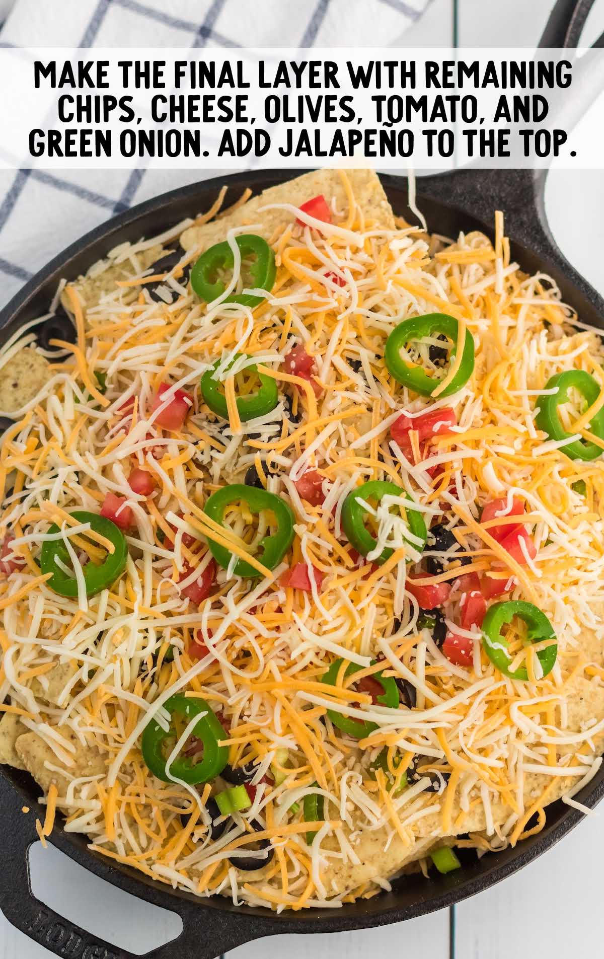 nachos topped with more toppings