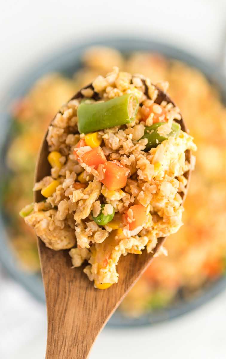 close up overhead shot of a spoonful of Cauliflower Fried Rice