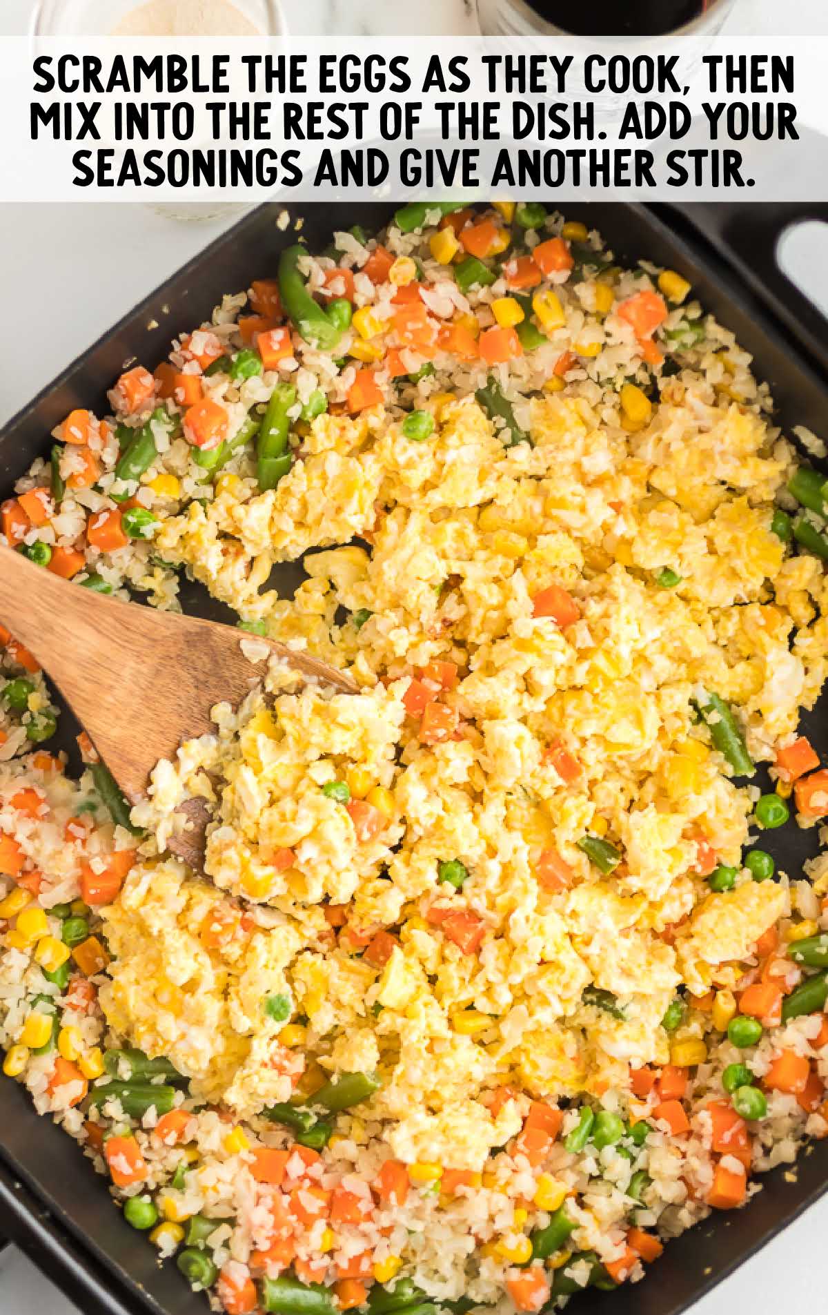 Cauliflower Fried Rice being cooked in a skillet