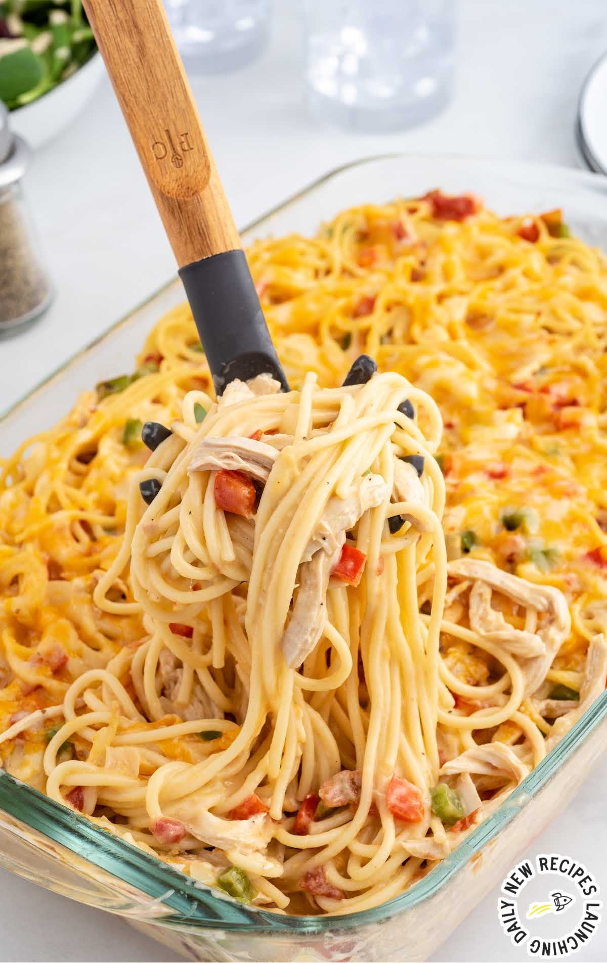 close up shot of a baking dish full of Chicken Spaghetti