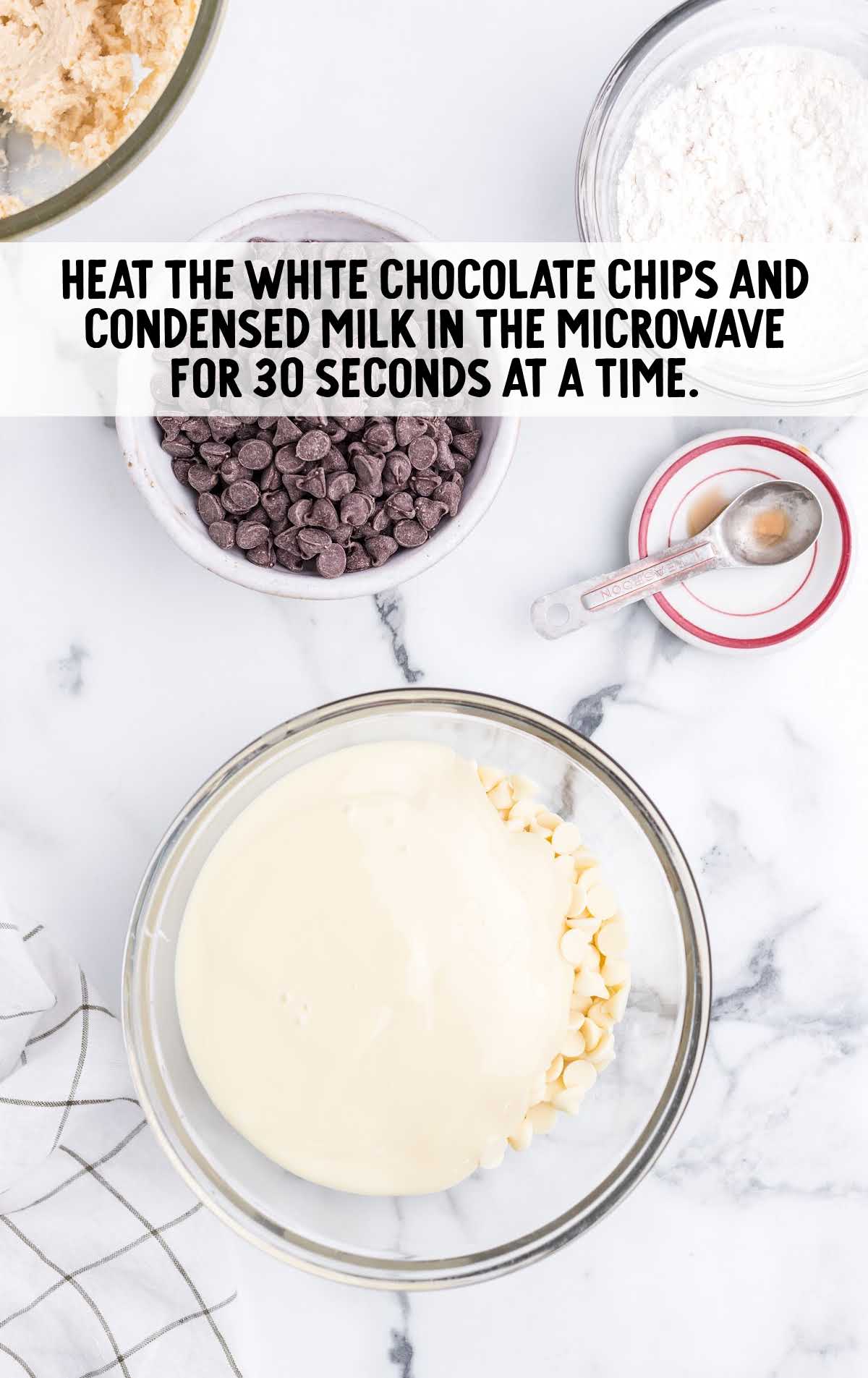 white chocolate chips and condensed milk in a bowl