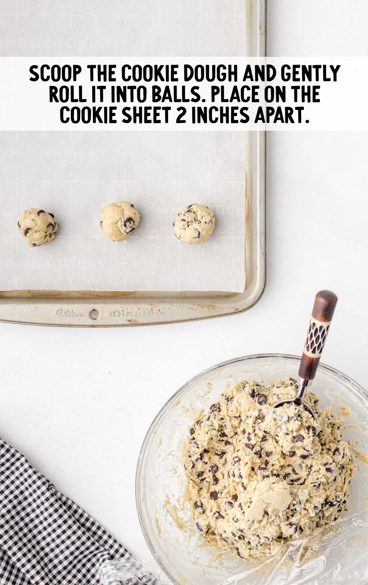cookie dough rolled into balls and placed on a baking sheet