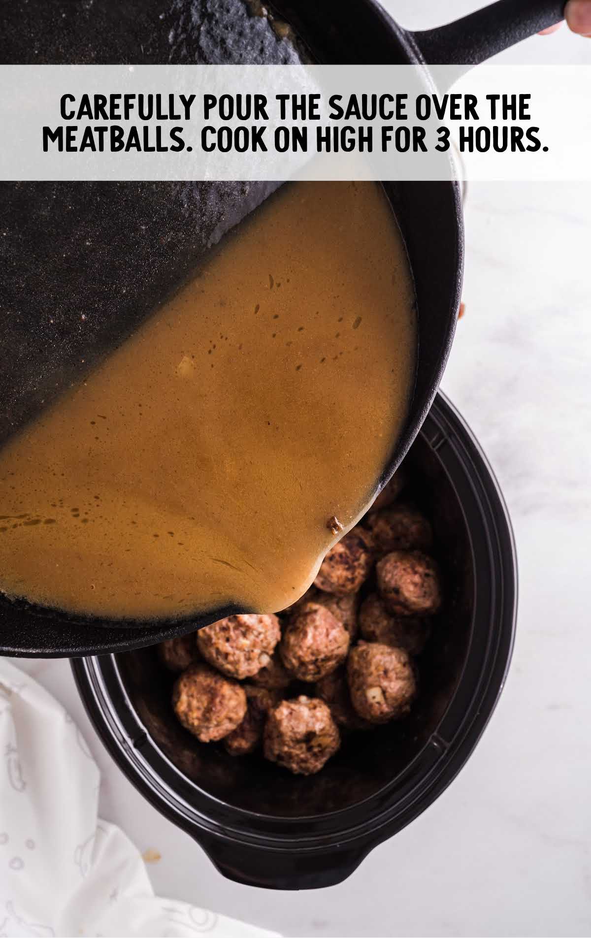 sauce poured over the cooked meatballs in a crockpot