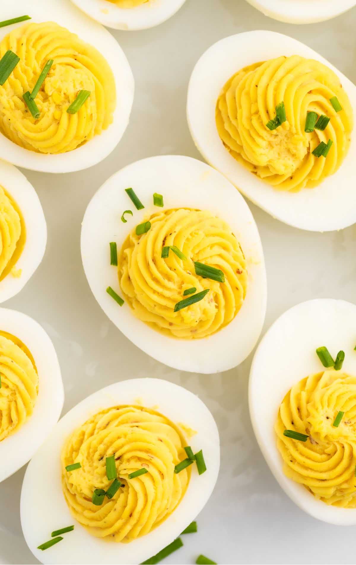 close up overhead shot of Deviled Eggs garnished with chives