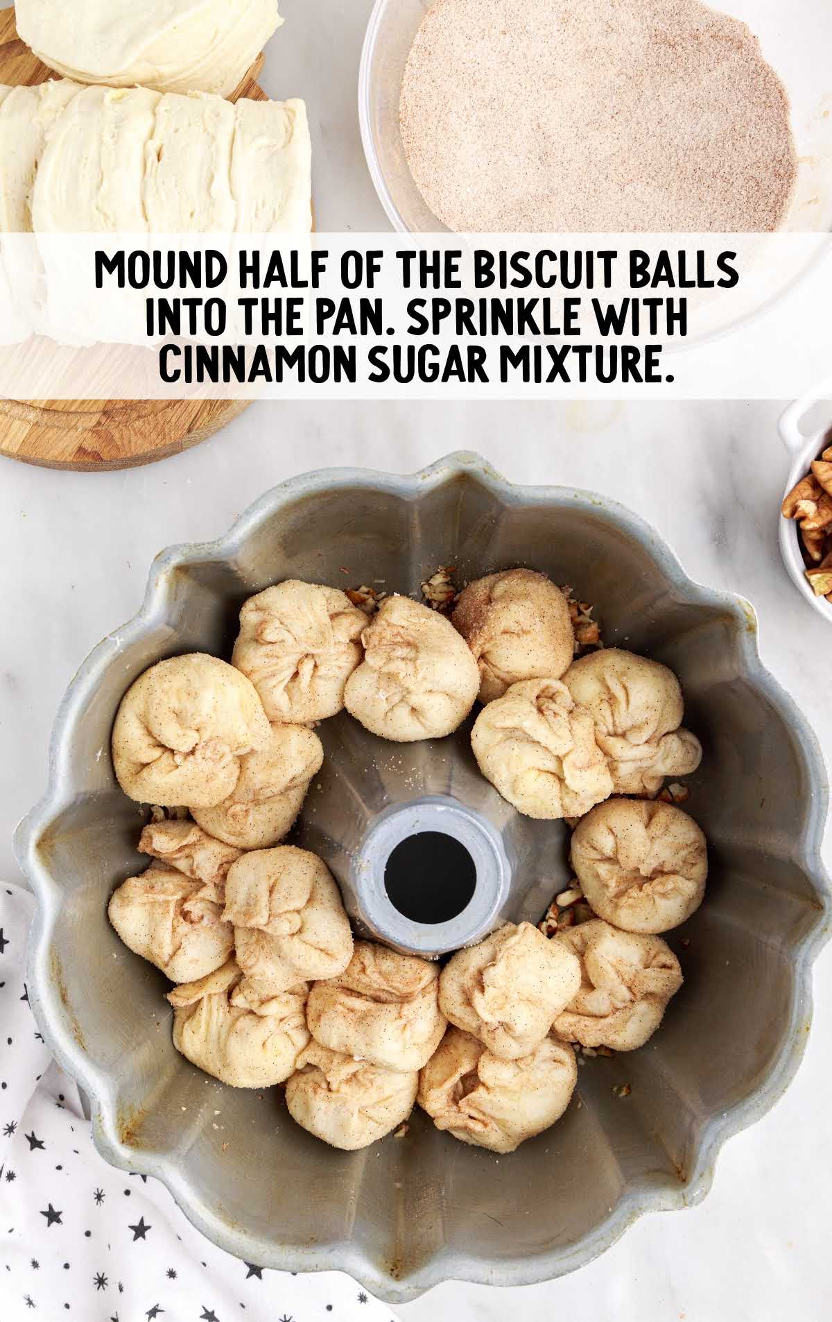 biscuit balls placed into the bundt pan