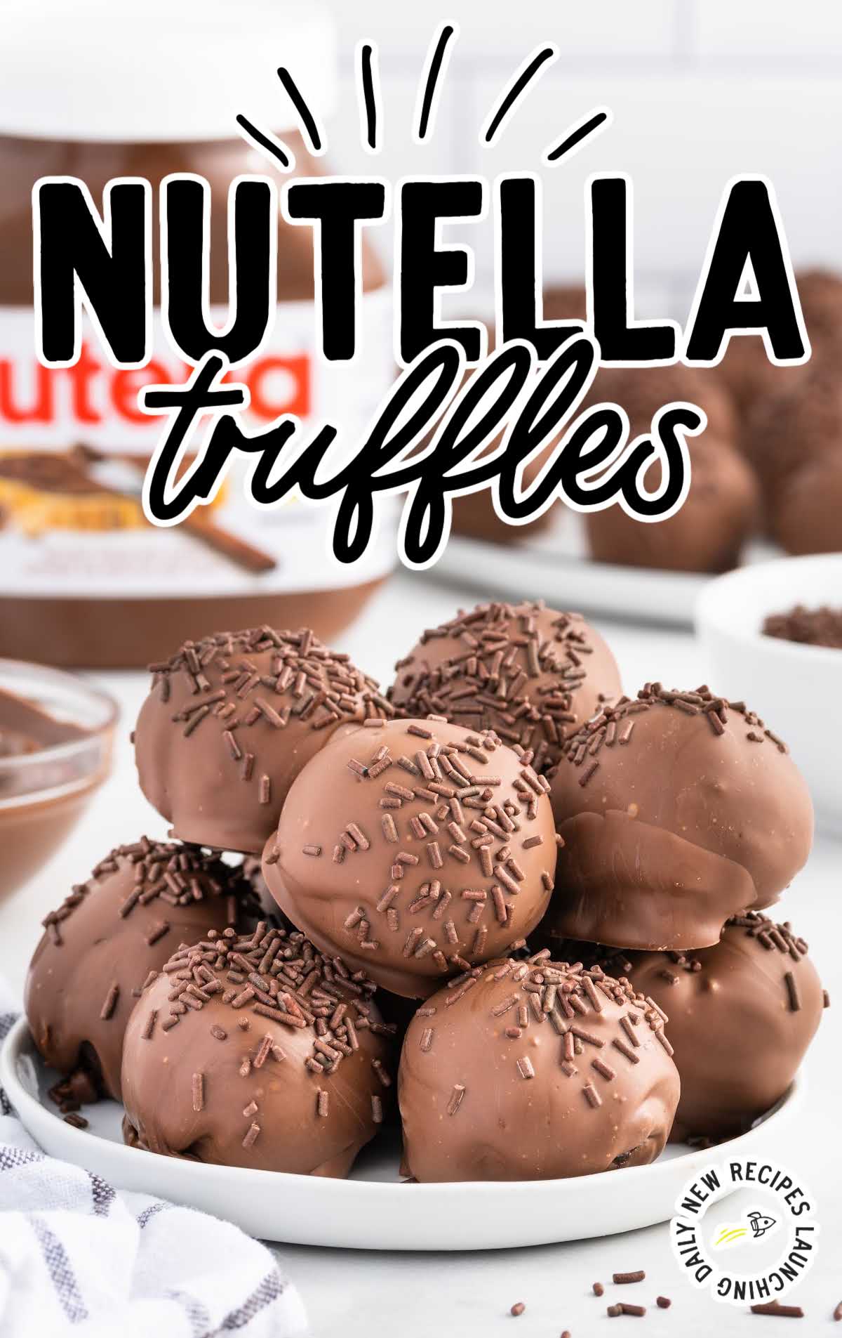 close up shot of a plate of Nutella truffles topped with chocolate sprinkles