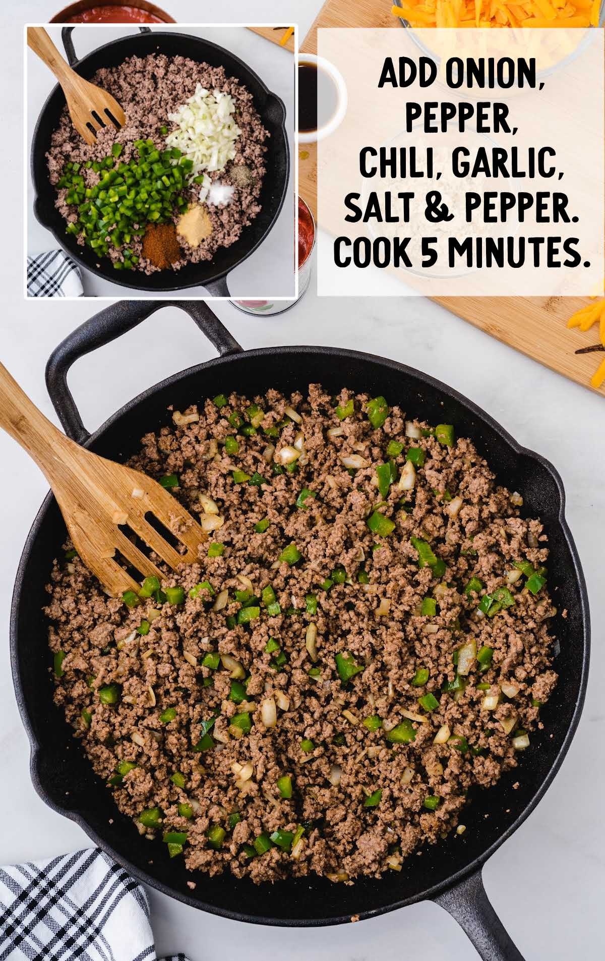 ground beef cooked in a skillet with vegetables and seasonings