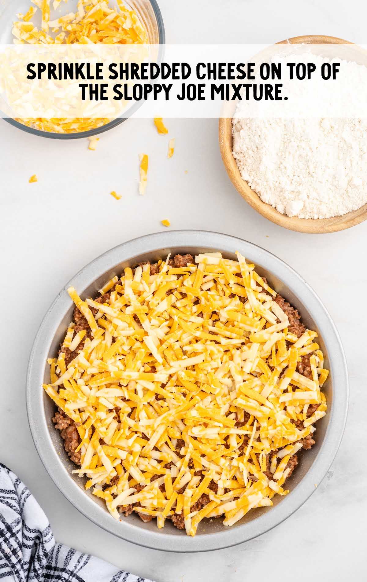 sloppy Joe mixture topped with shredded cheese
