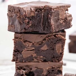 close up shot of chocolate brownies stacked on top of each other
