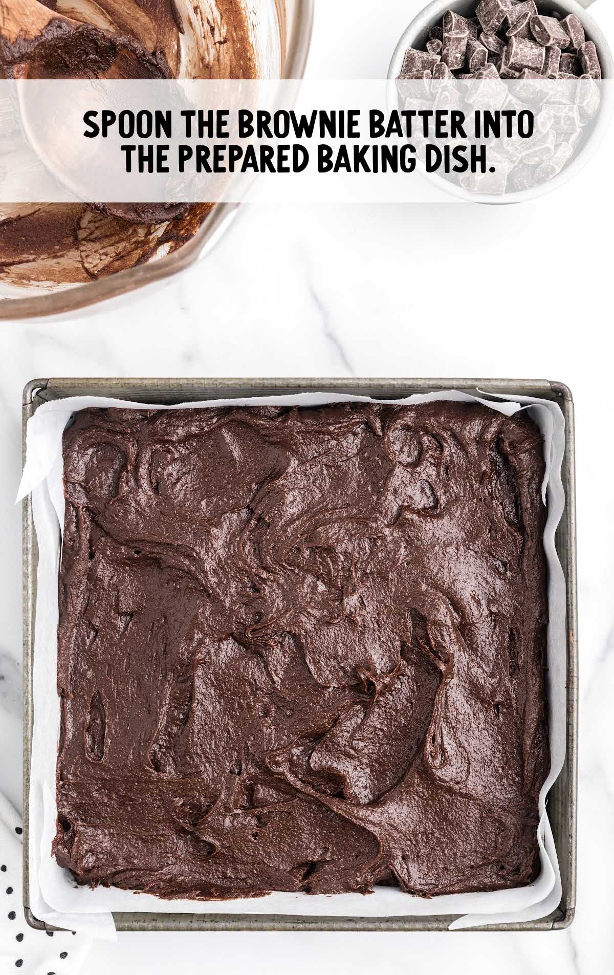 brownie batter placed into the baking dish