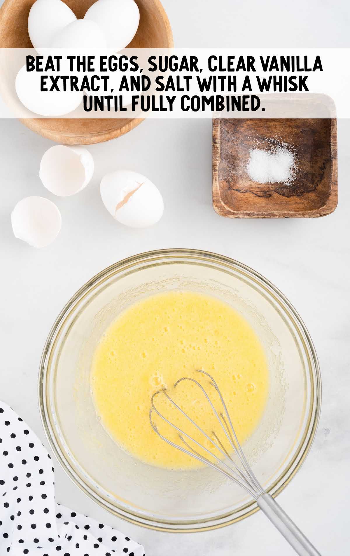 eggs, sugar, vanilla, and salt whisked together in a bowl