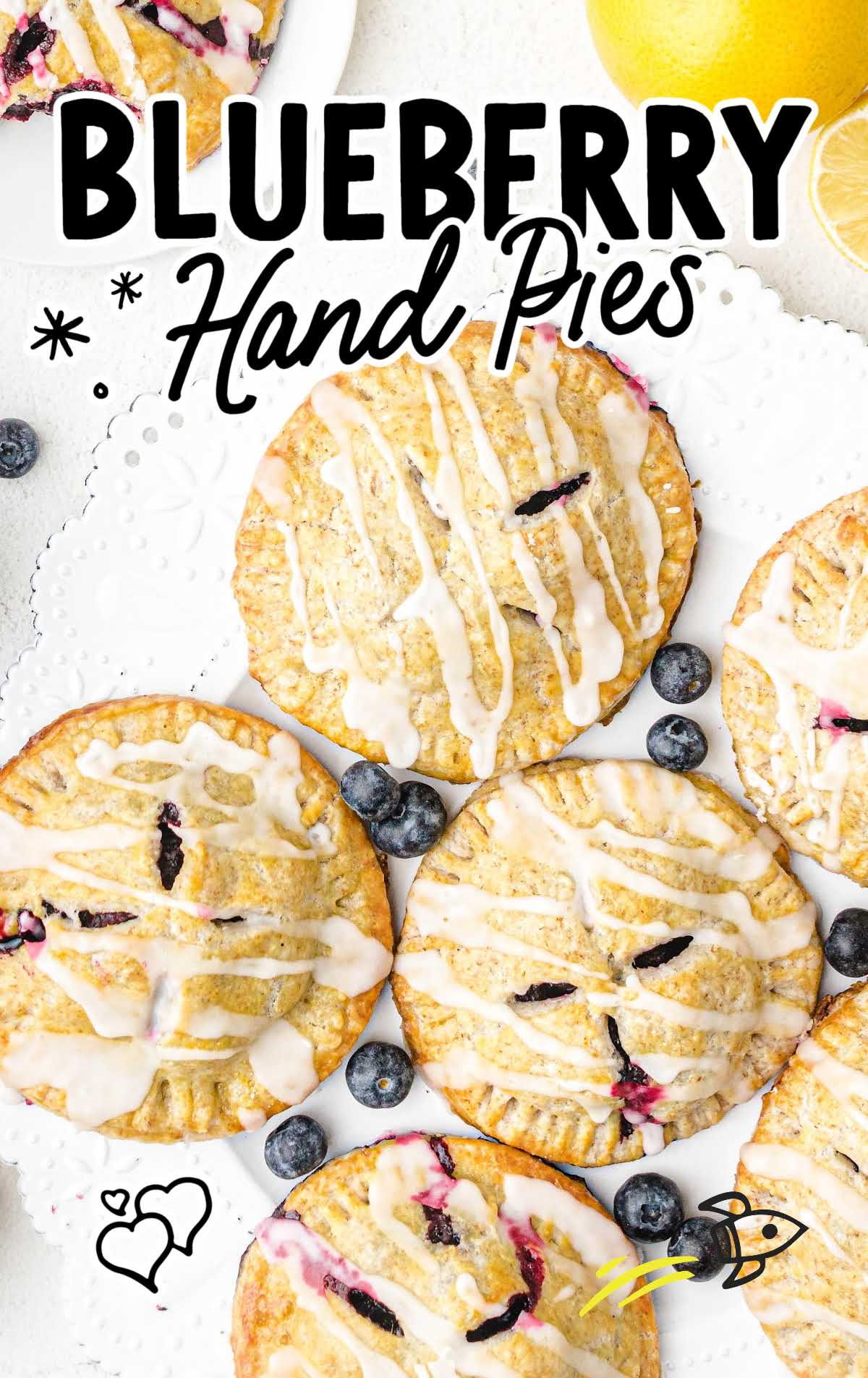 overhead shot of blueberry hand pies drizzled with glaze