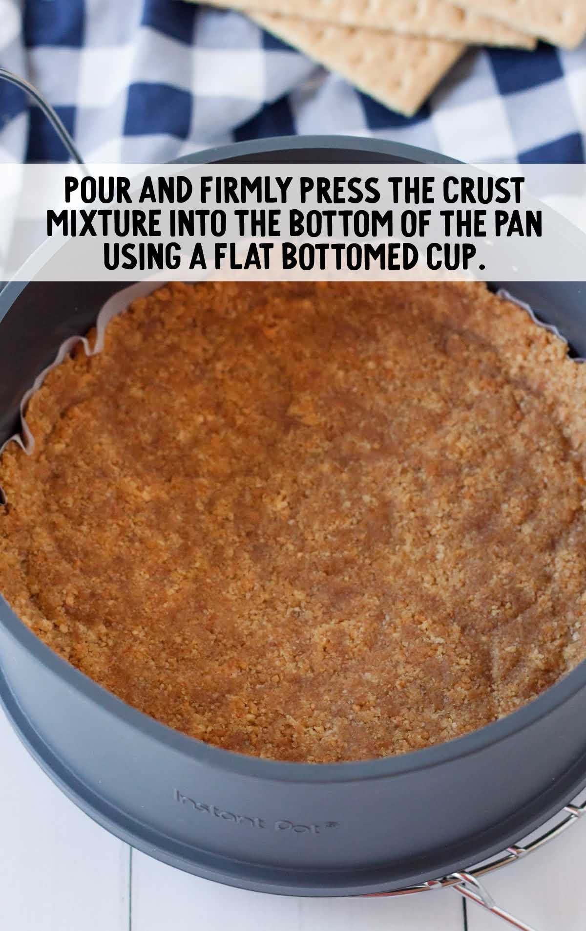 crust mixture placed on the bottom of the pan