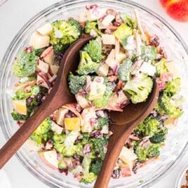 close up shot of a serving bowl of Broccoli Apple Salad