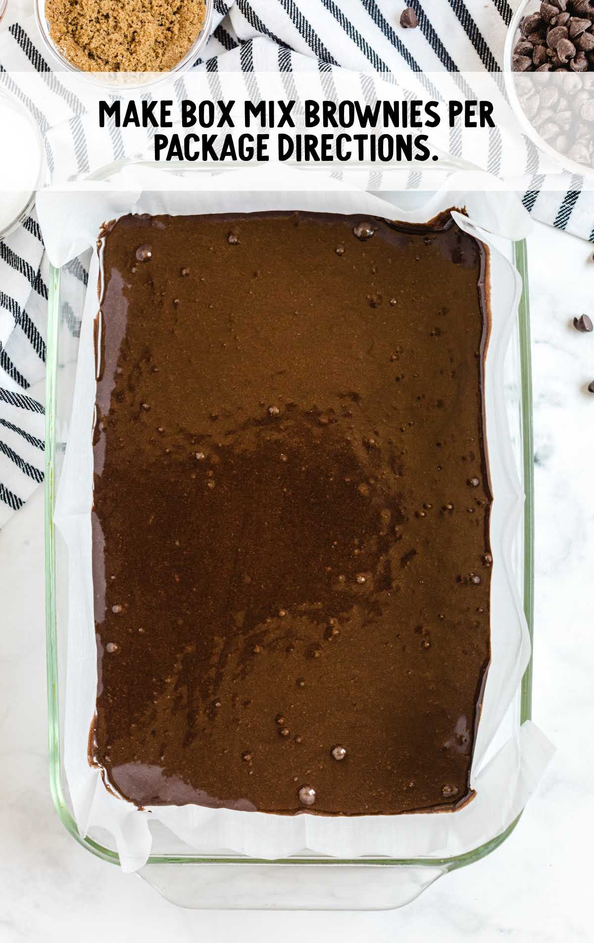 brownie batter placed into a baking dish