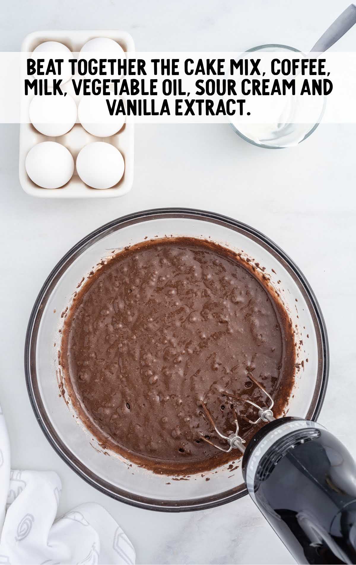 cake mix, coffee, milk, vegetable oil, sour cream and vanilla extract whisked together 