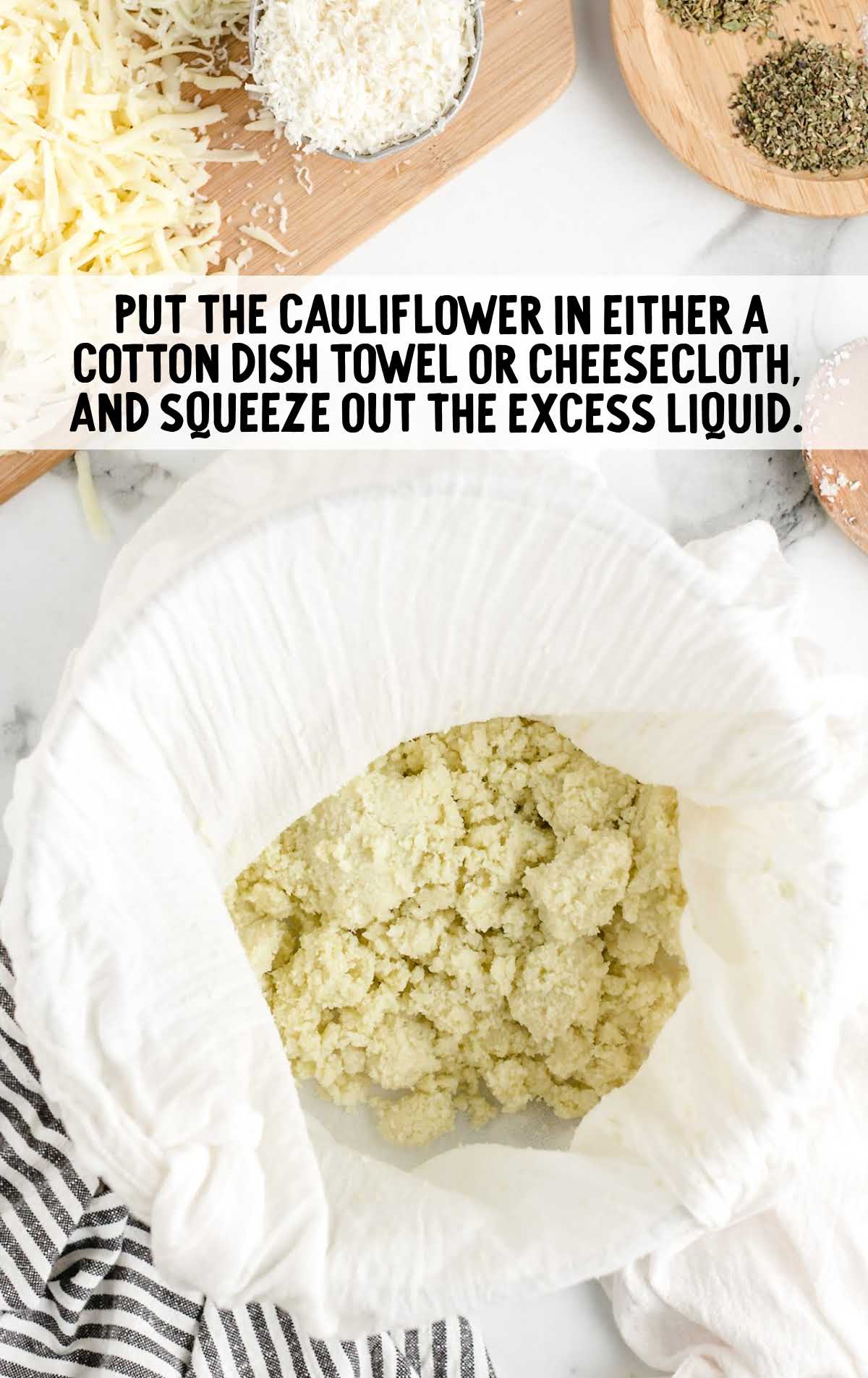 excess liquid squeezed out of the cauliflower with a cotton dish towel
