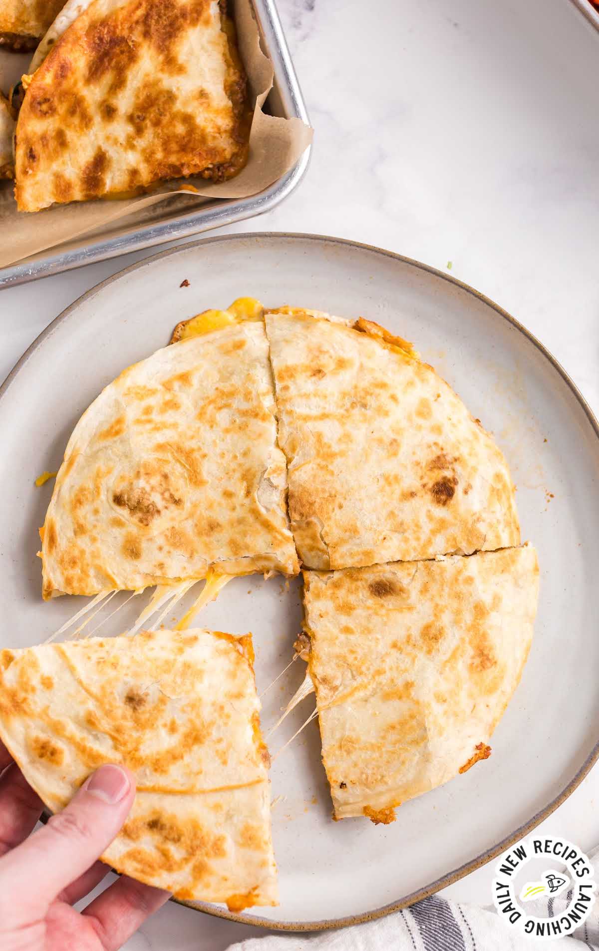 overhead shot of Cheesy Beef Quesadillas on a plate