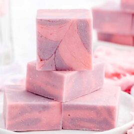 close up shot of a pile of of Cotton Candy Fudge on a plate