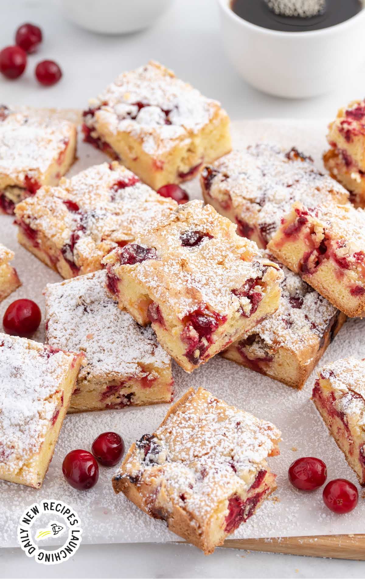 pieces of Cranberry Cake topped with powdered sugar