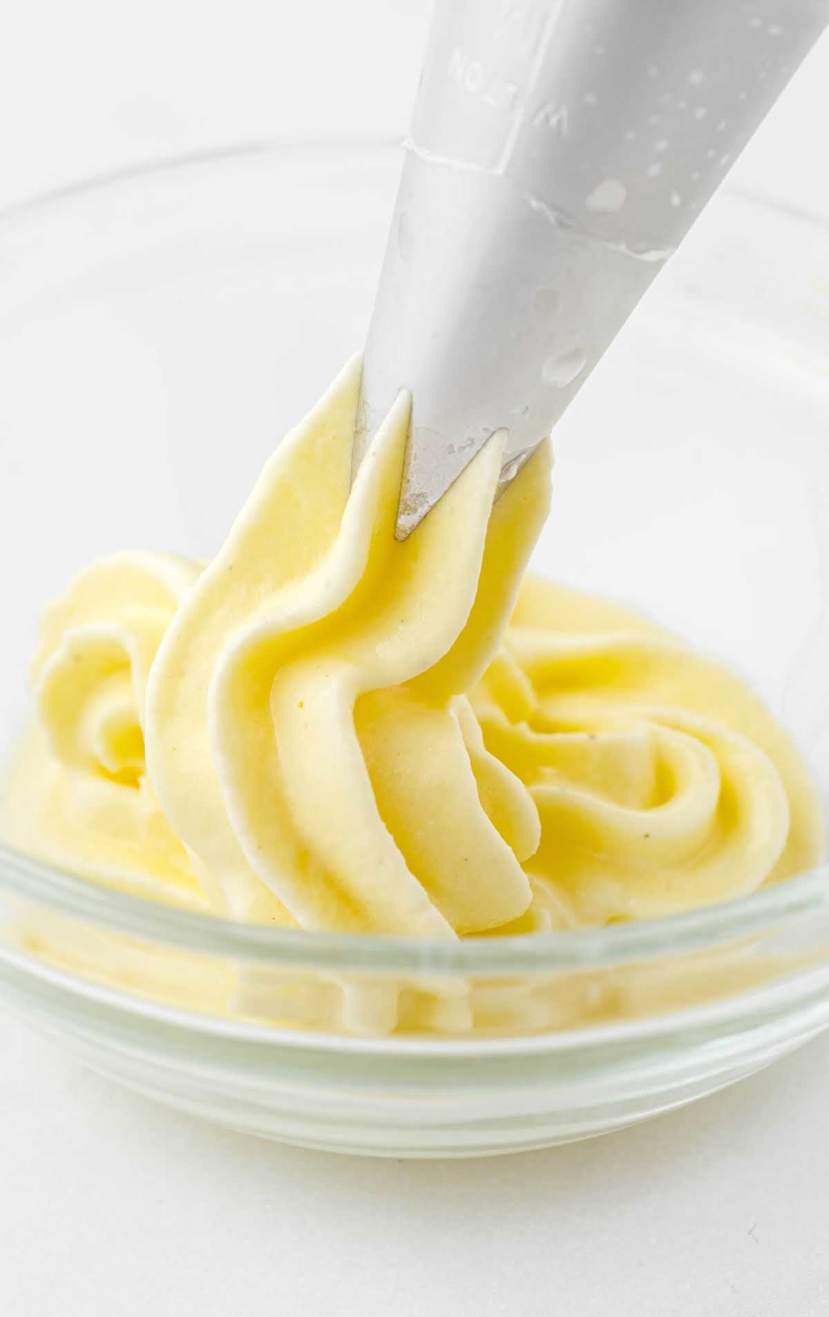 Dole Whip piped into a in a small clear bowl