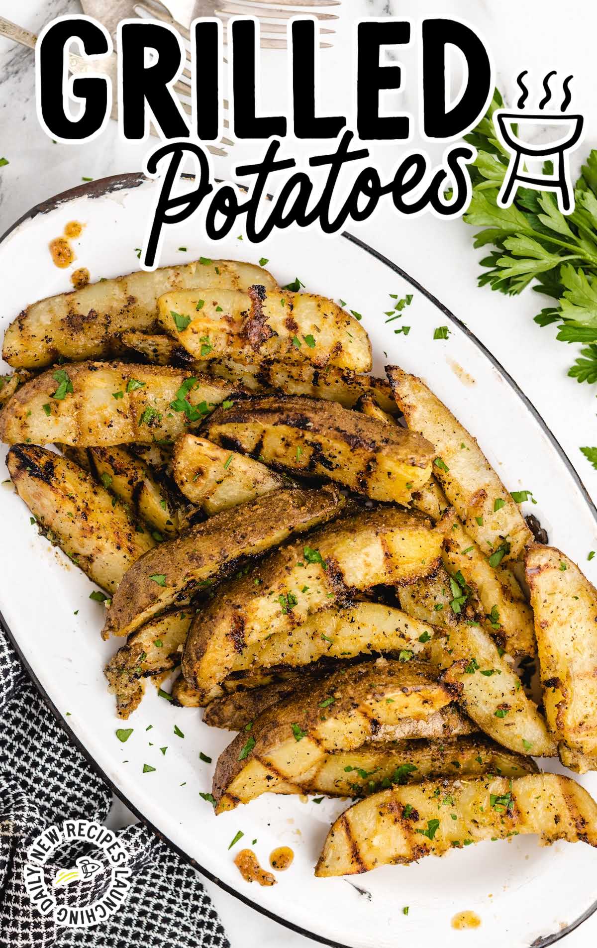 overhead shot of a plate of Grilled Potatoes garnished with parsley