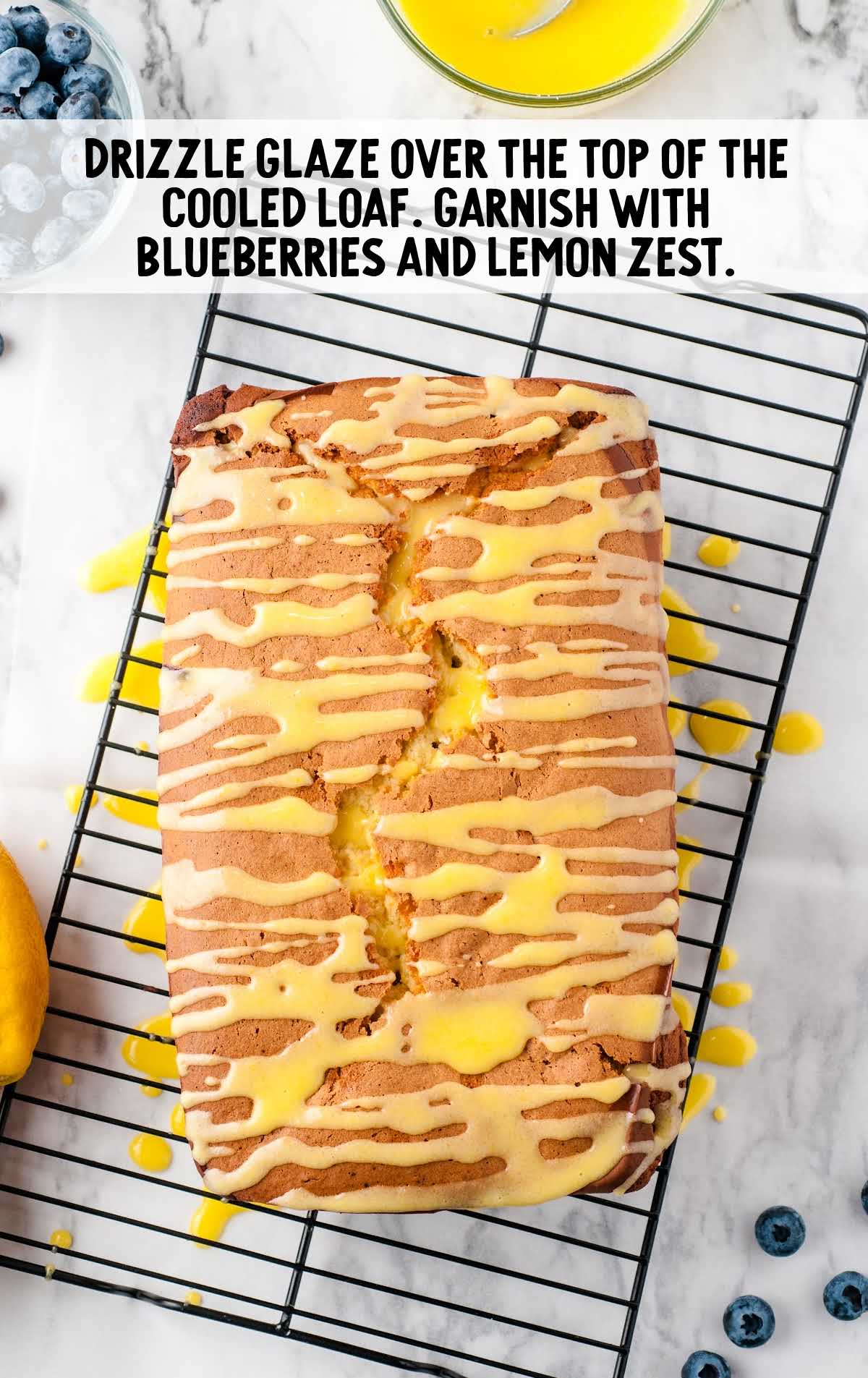 glaze drizzled on top of the lemon blueberry bread