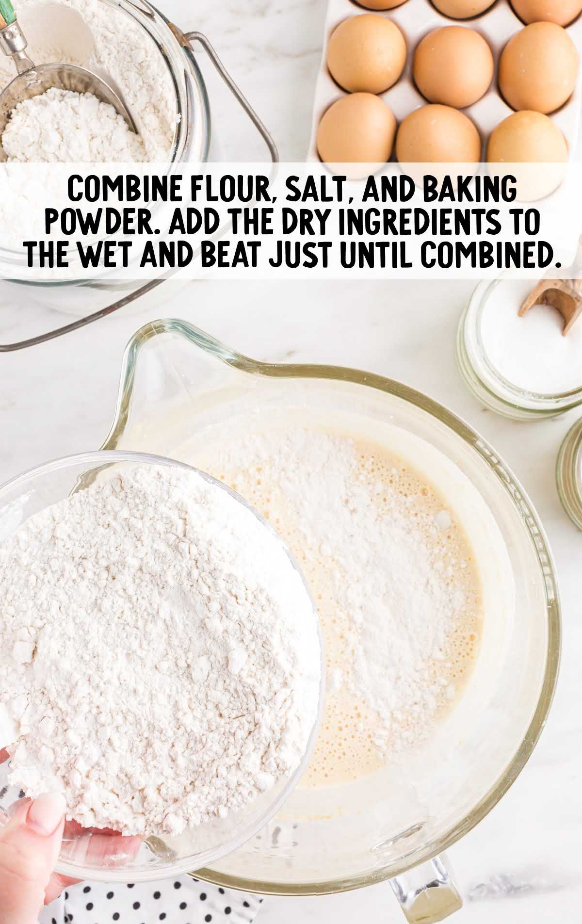 flour, salt, and baking powder combined in a bowl then added to the wet ingredients 