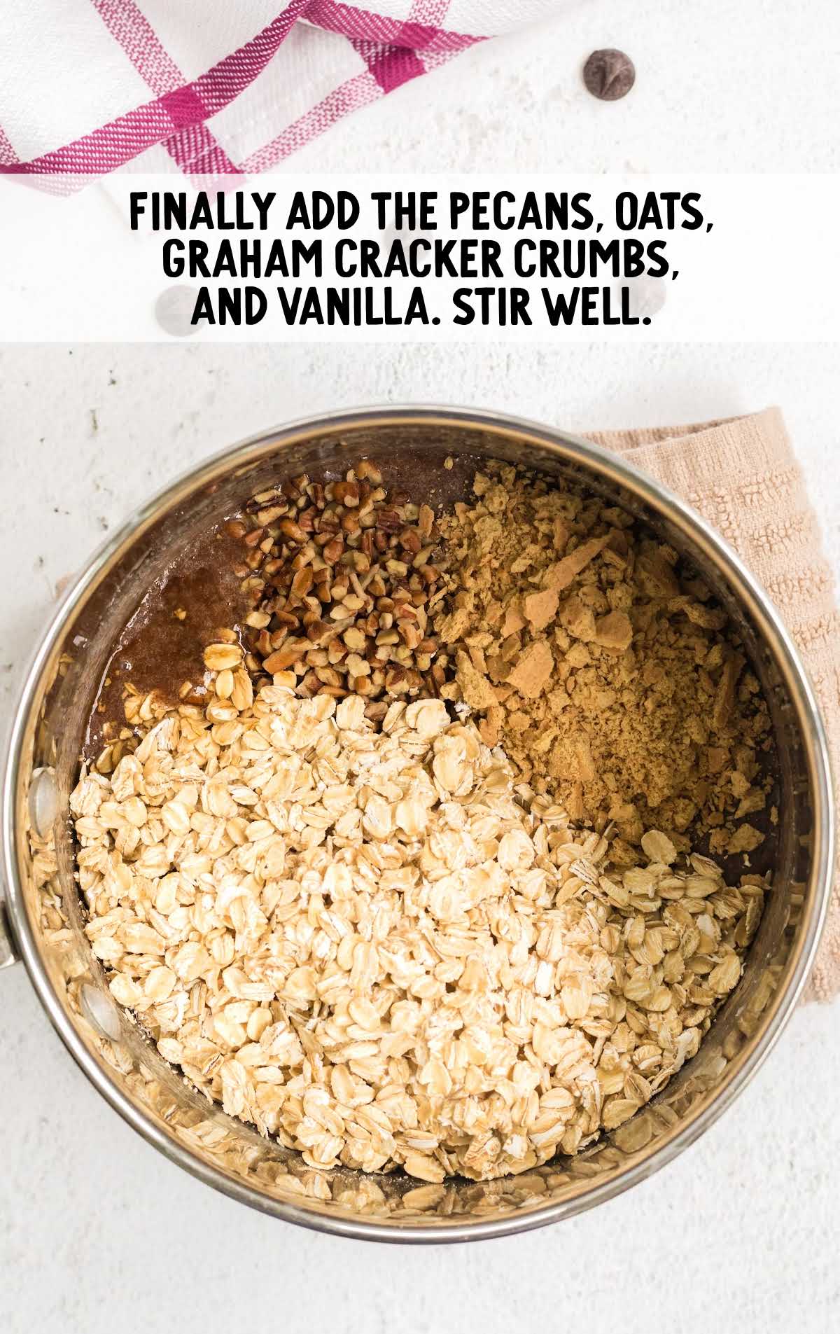 pecan, oats, graham cracker crumbs, and vanilla added to the pot