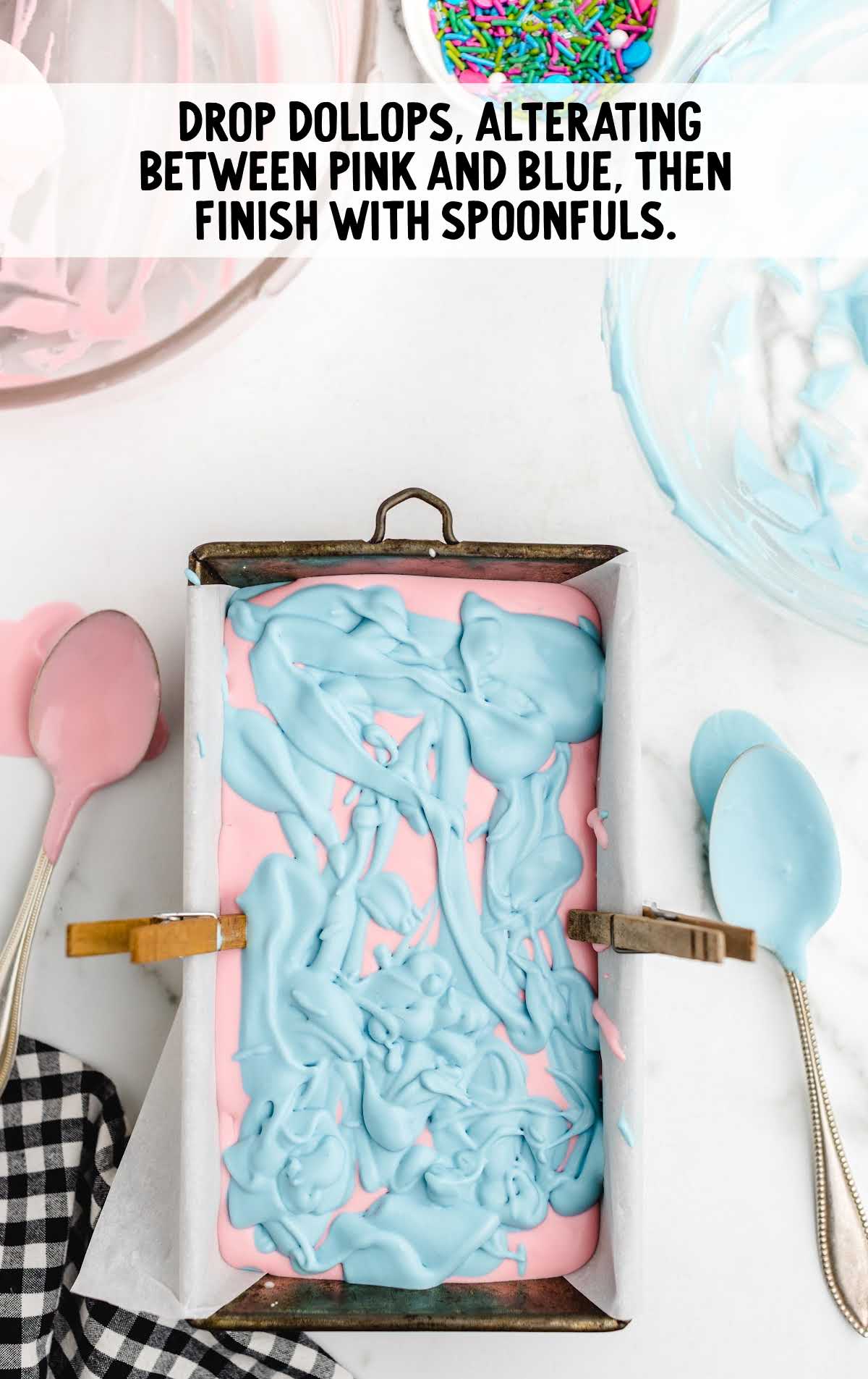 dollops on top of cotton candy ice cream in a loaf pan