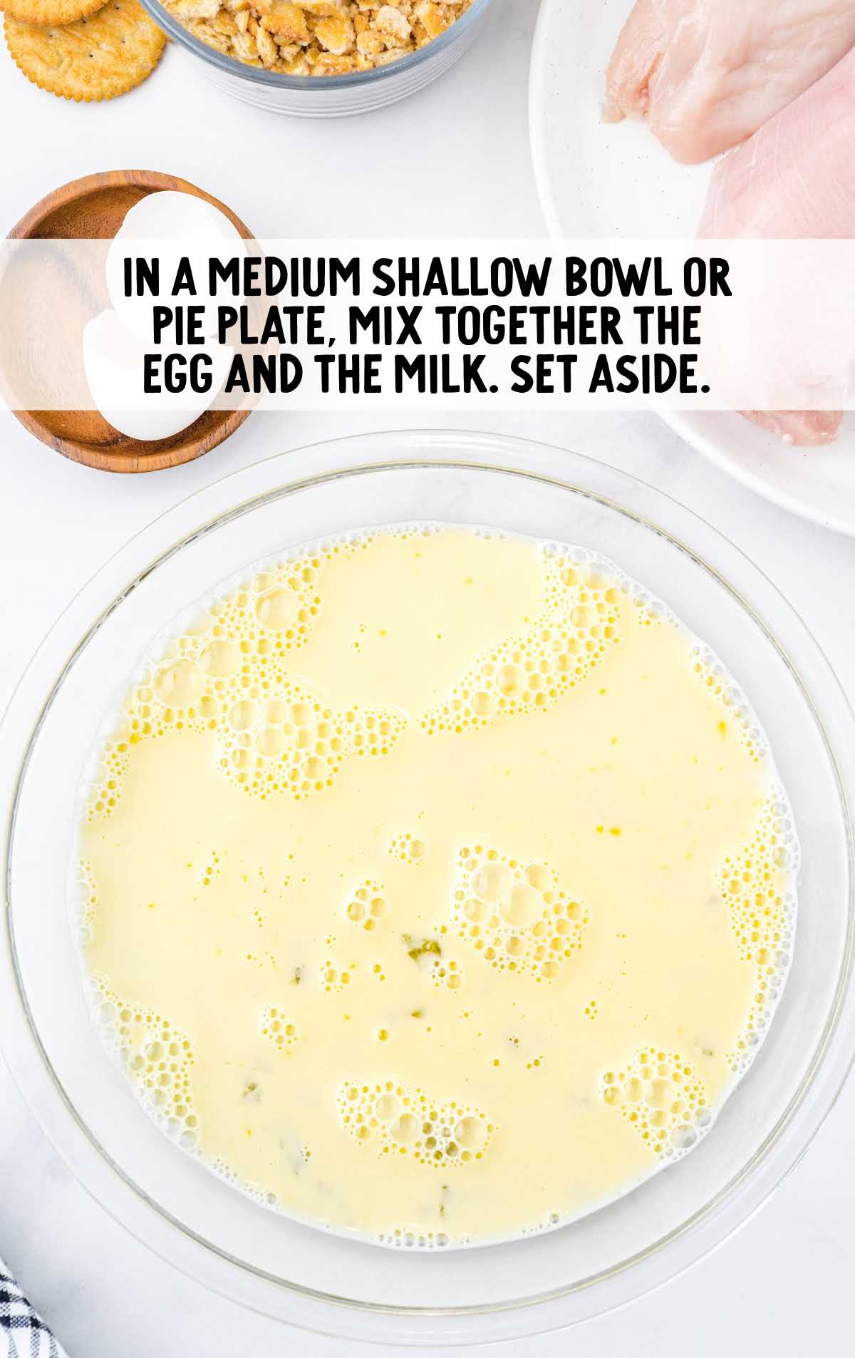 egg and milk whisked together in a bowl