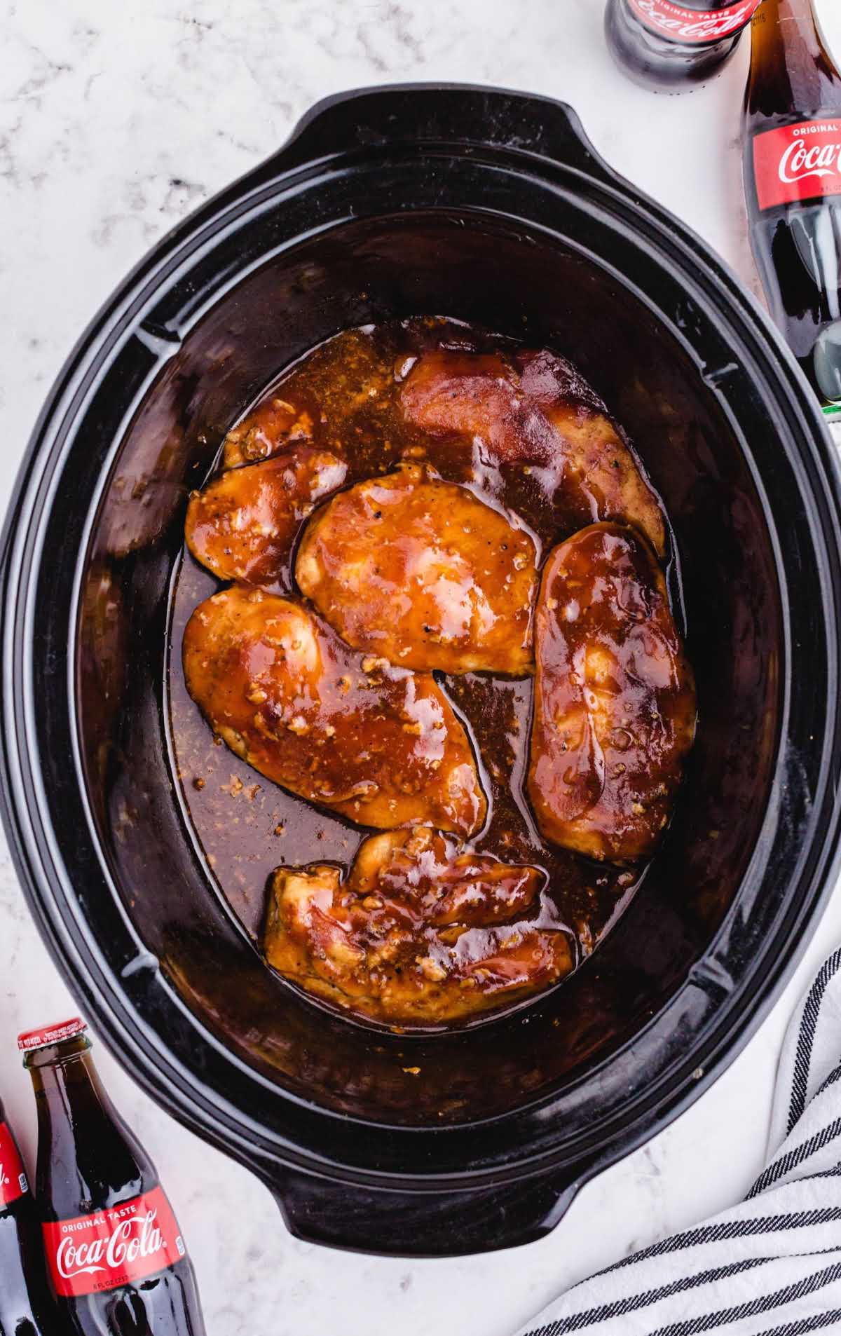 close up shot of Coca Cola Chickens in a slow cooker