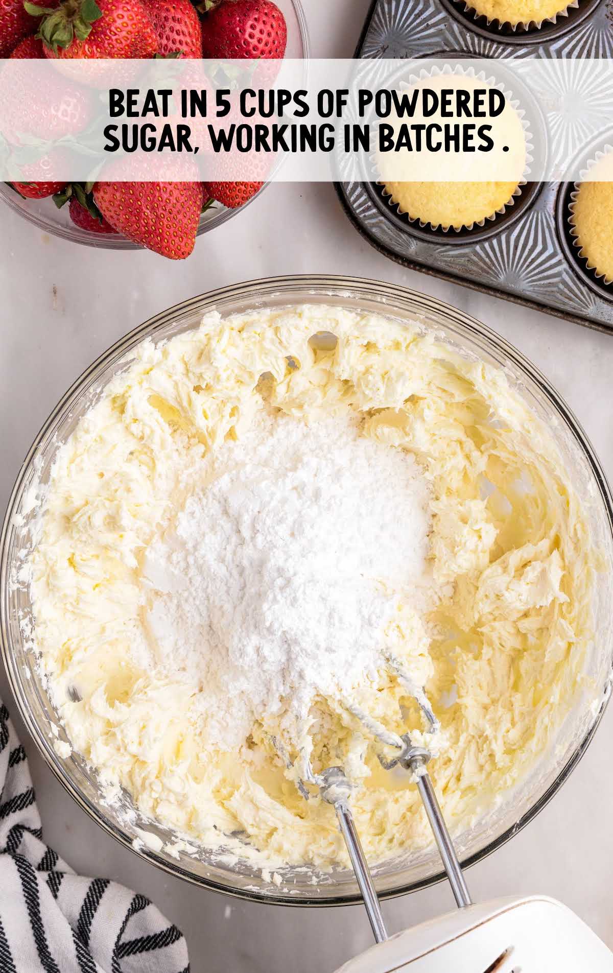 powder sugar blended into the cream cheese mixture in a bowl