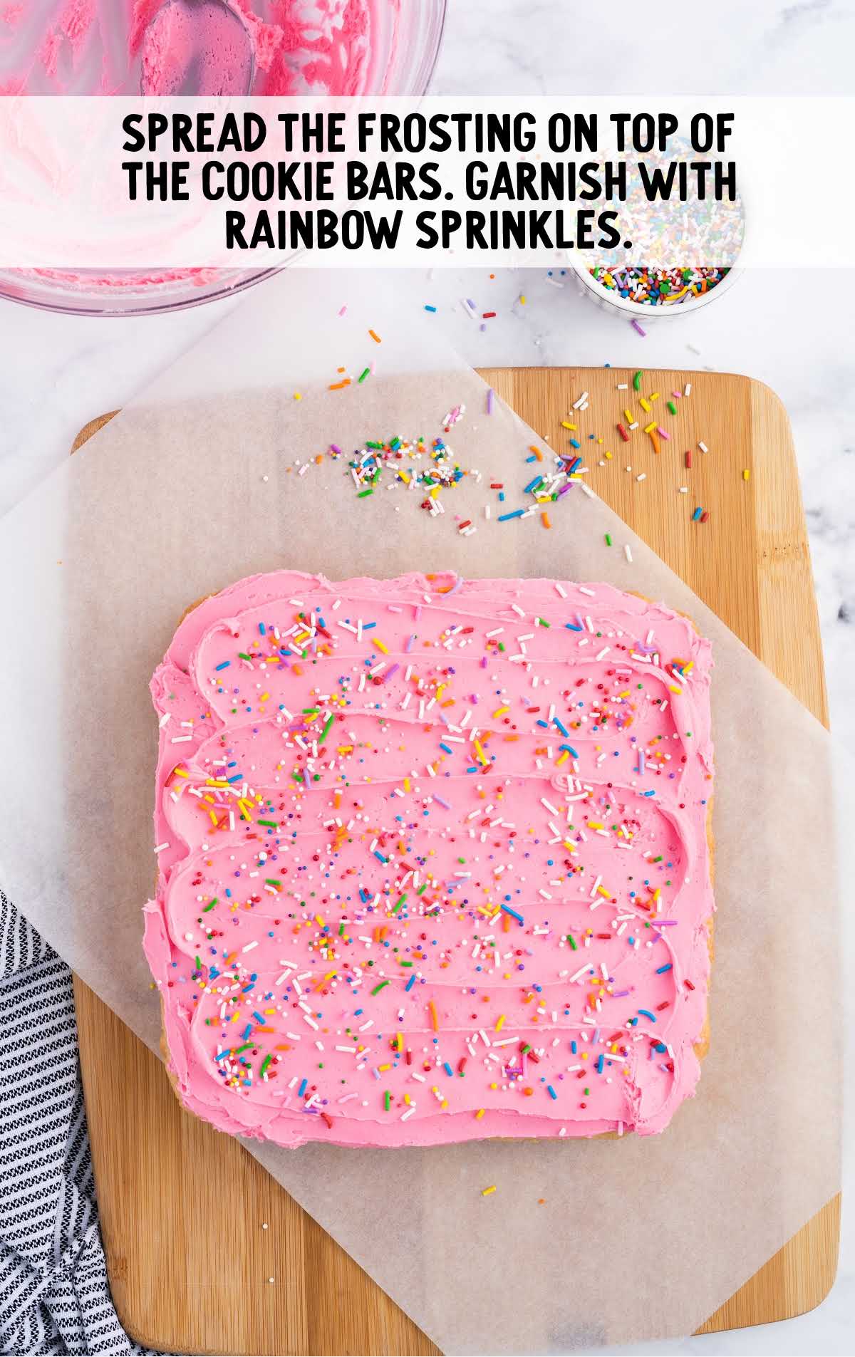 cookie bars frosted and sprinkled with sprinkles