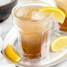 close up shot of a glass of Texas Tea garnish with slices of lemon