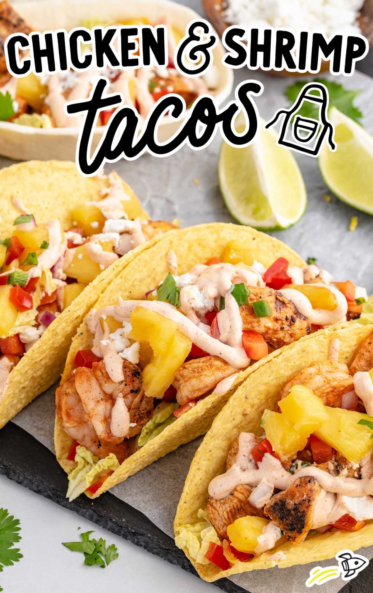 Chicken and Shrimp Tacos topped with sauce