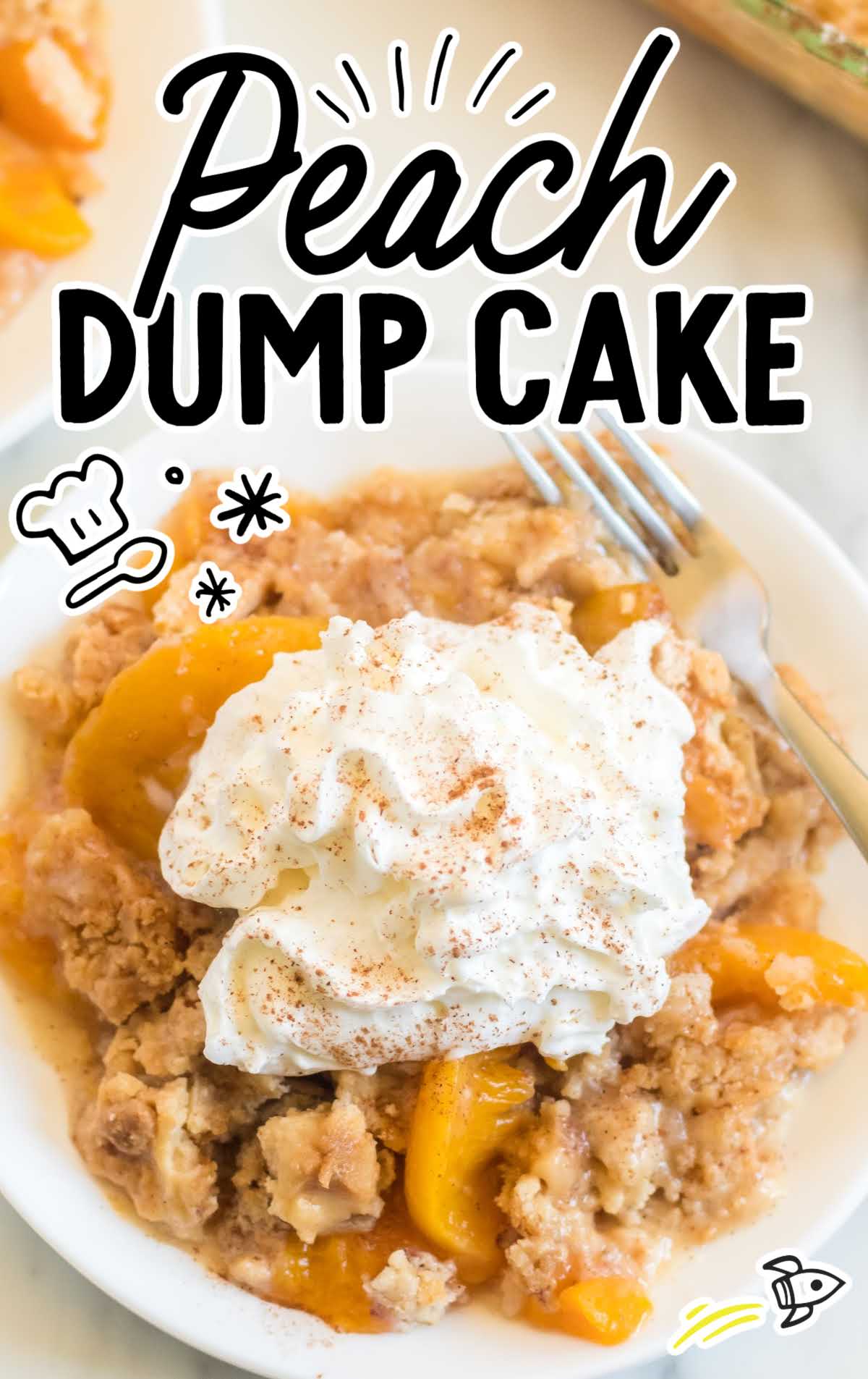 close up overhead shot of a serving of peach dump cake topped with whipped cream
