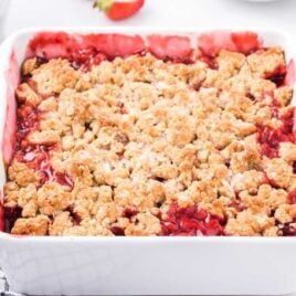 close up shot of a Rhubarb Strawberry Crisp in a baking dish