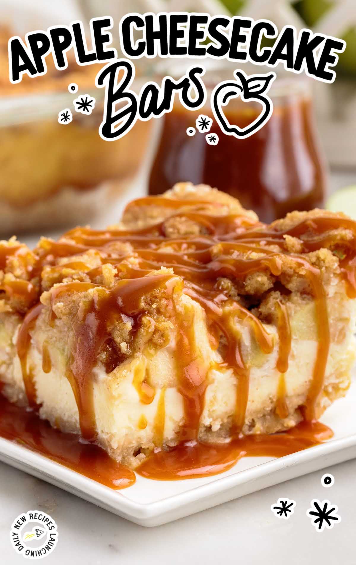a slice of Apple Cheesecake Bar on a plate topped with caramel sauce