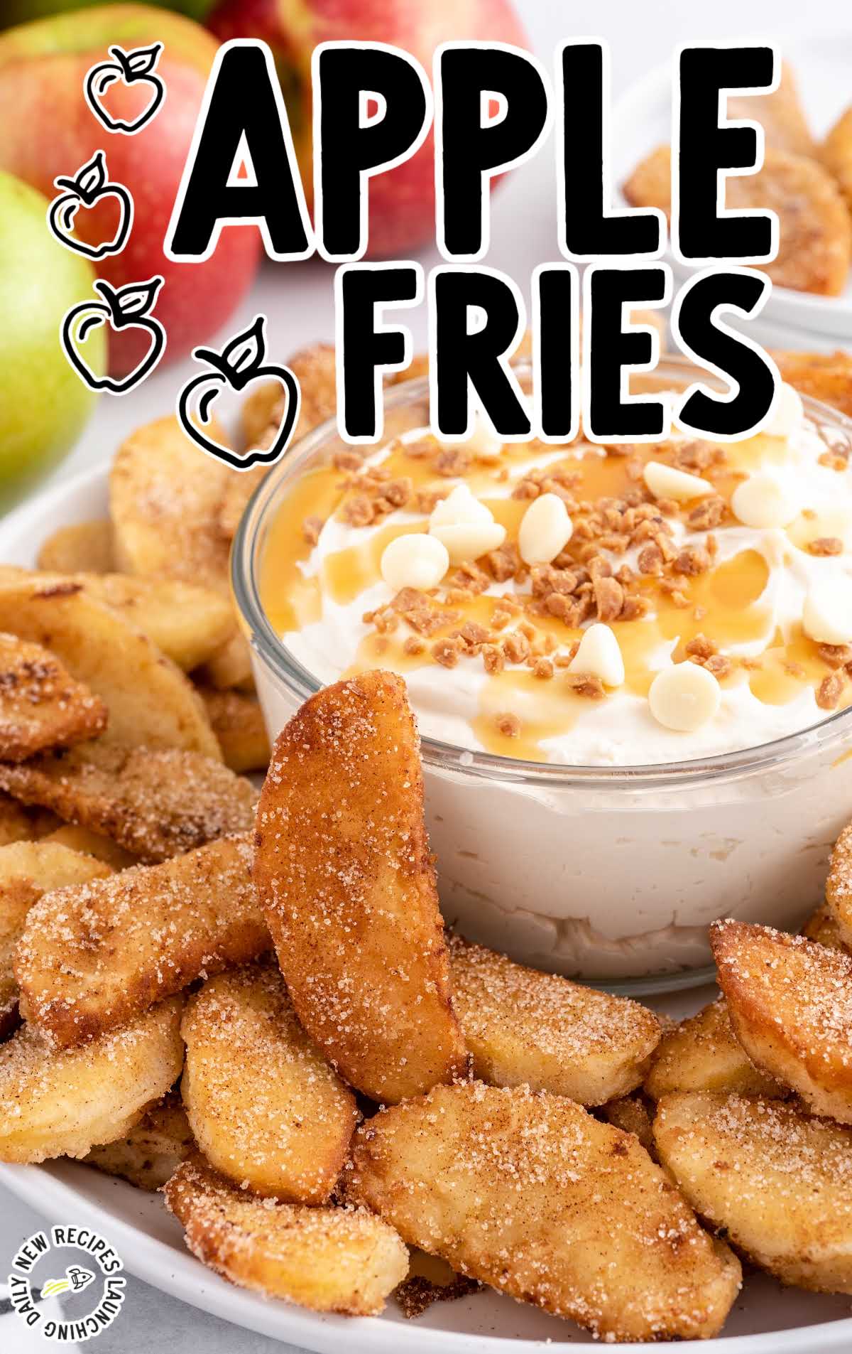 a bunch of Apple Fries on a plate with a bowl of dip
