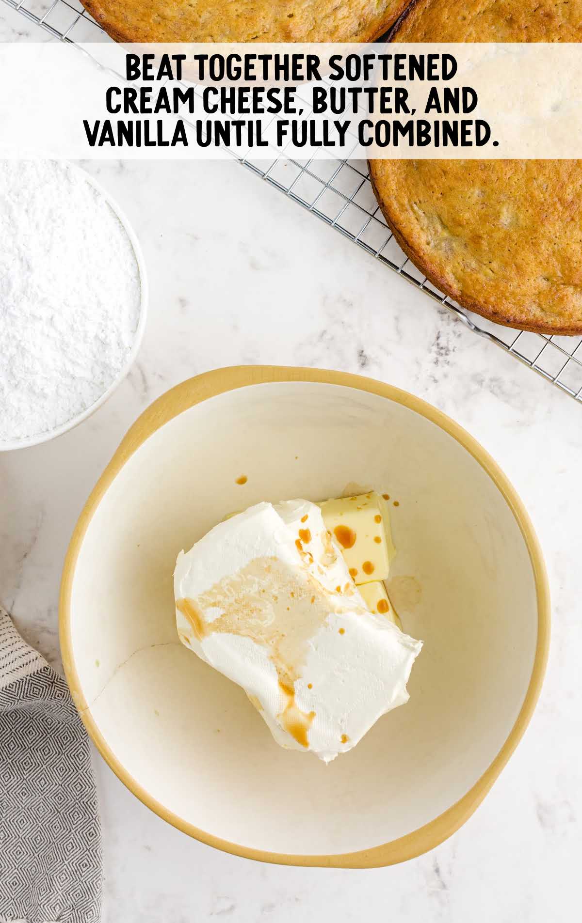 cream cheese, butter, and vanilla in a bowl