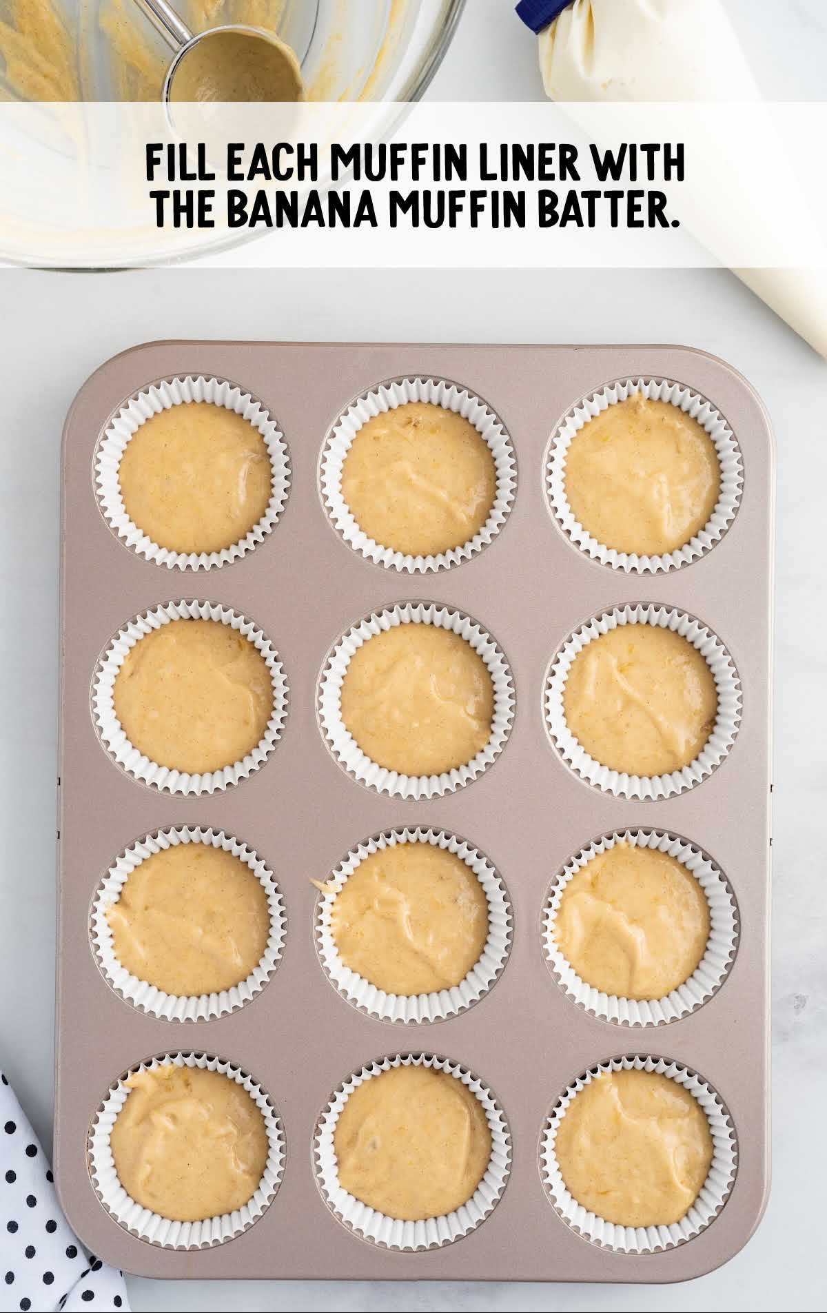 muffin liner filled with banana muffin batter