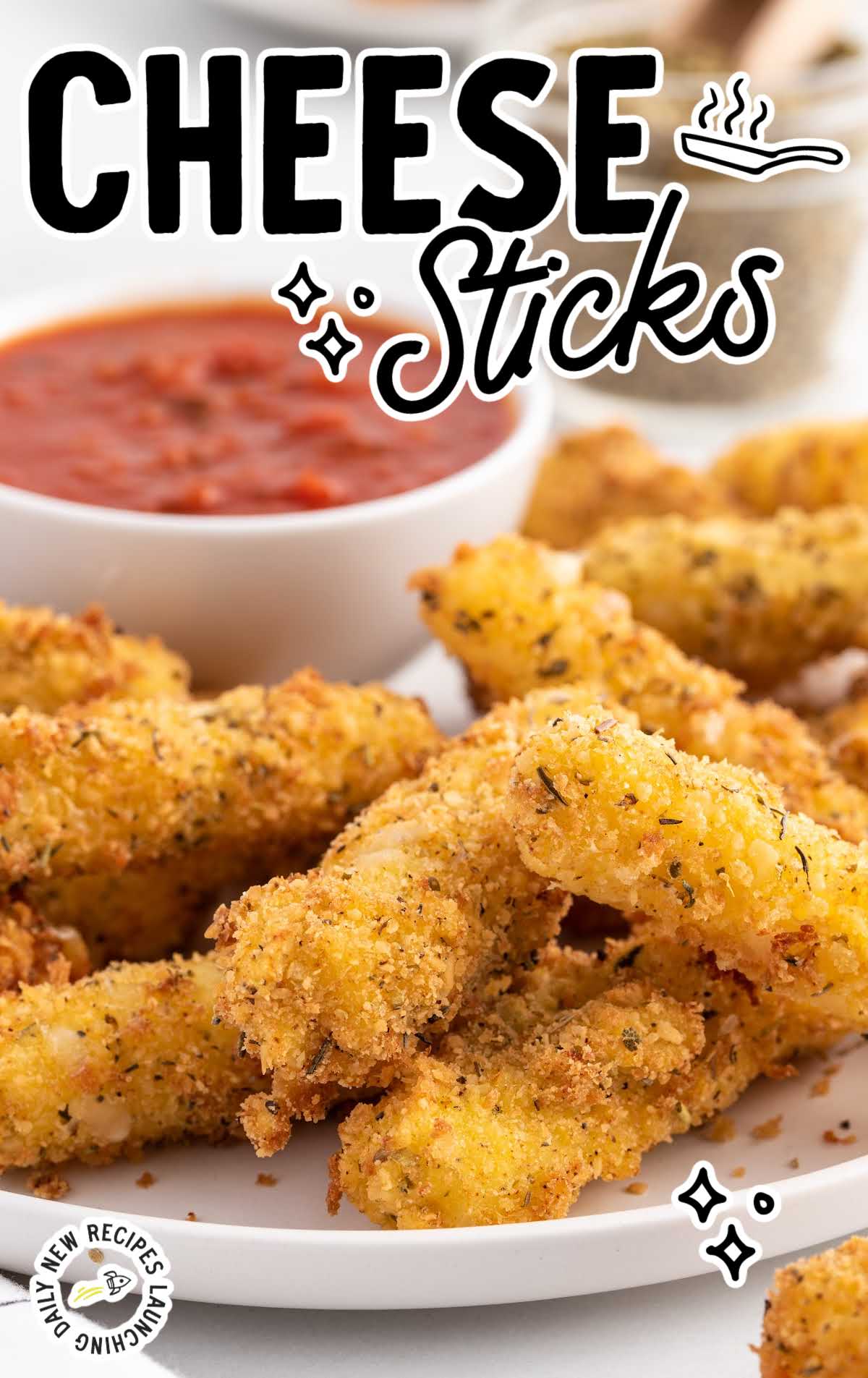 close up shot of Cheese Sticks on a plate with marinara sauce