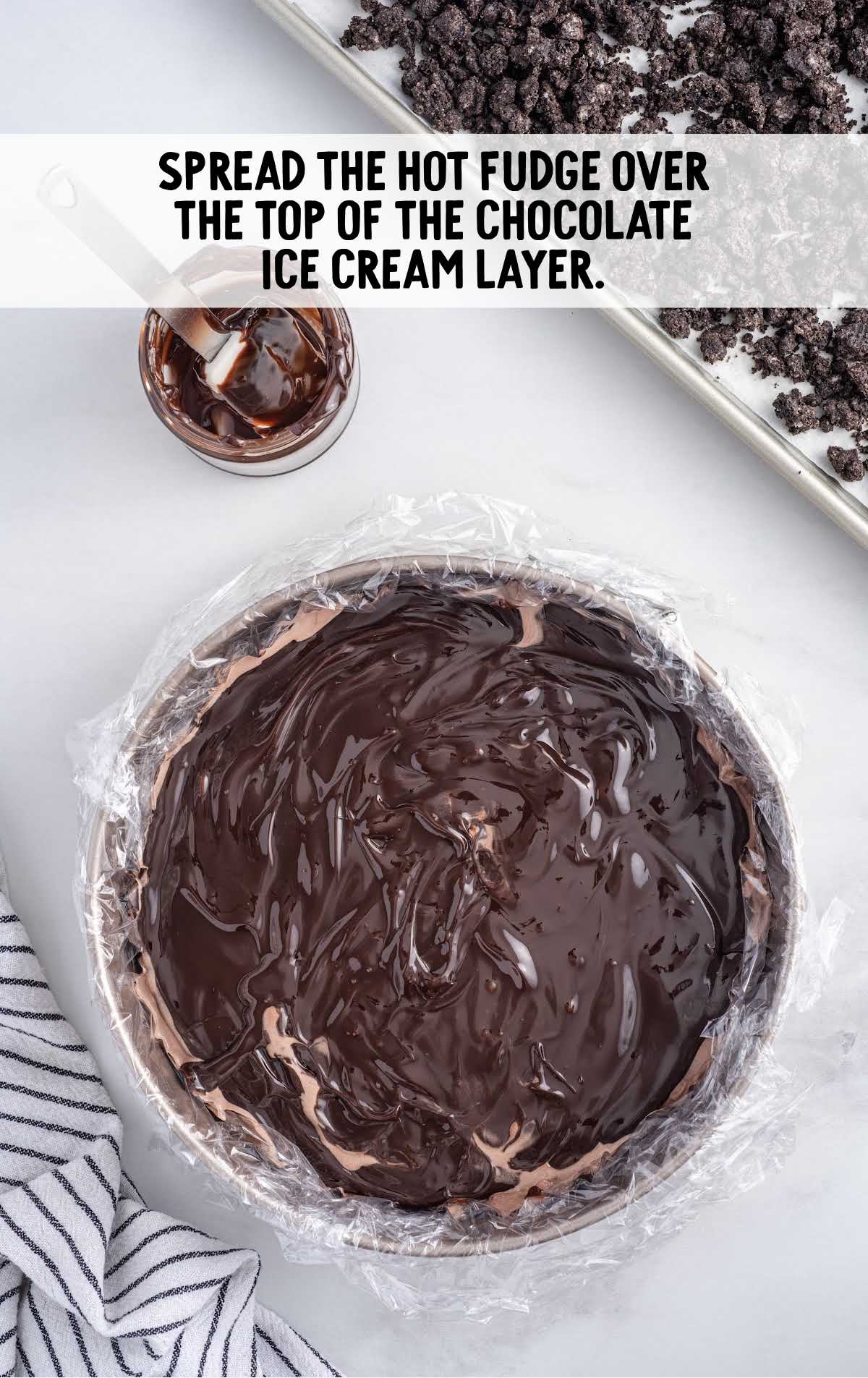 hot fudge spread over the chocolate ice cream layer